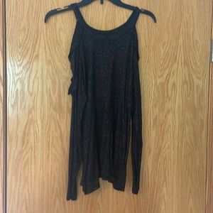 long sleeve with an open shoulder ruffle detail